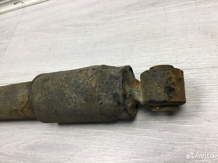 Амортизатор подвески задний левый Nissan