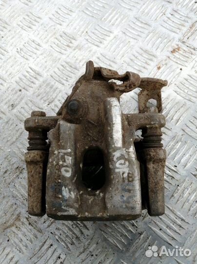 Суппорт задний левый Toyota Corolla E150 1.6