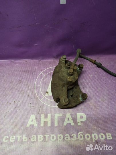 Суппорт тормозной передний правый Mitsubishi