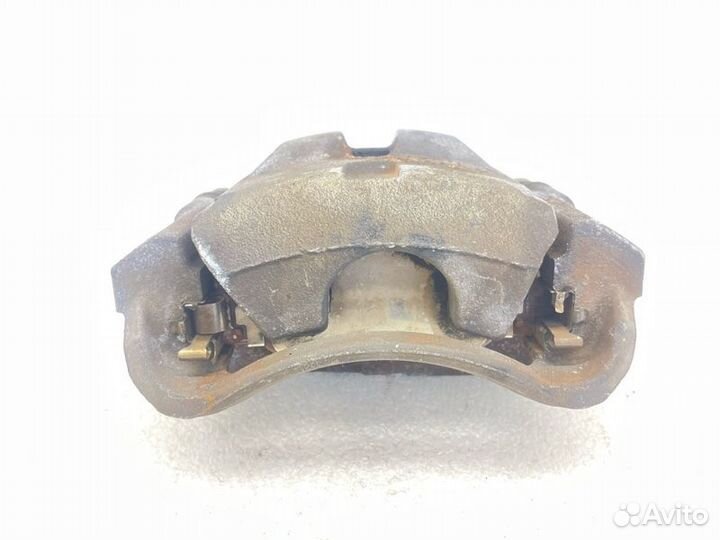 Суппорт тормозной передний правый Toyota Voxy