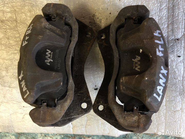 Суппорт тормозной передний Mitsubishi Lancer 10