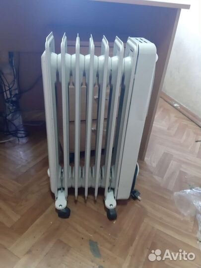 Масляный обогреватель delonghi