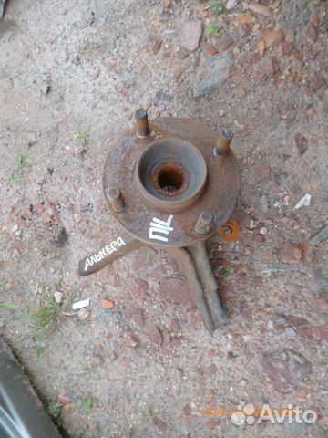 Кулак поворотный с ABS со ступицей Ниссан Альмера