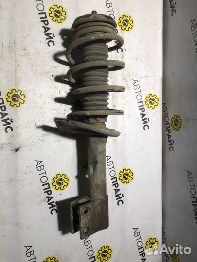 Стойка с пружиной в сборе передняя правая Peugeot