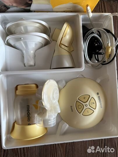 Молокоотсос medela swing flex электрический