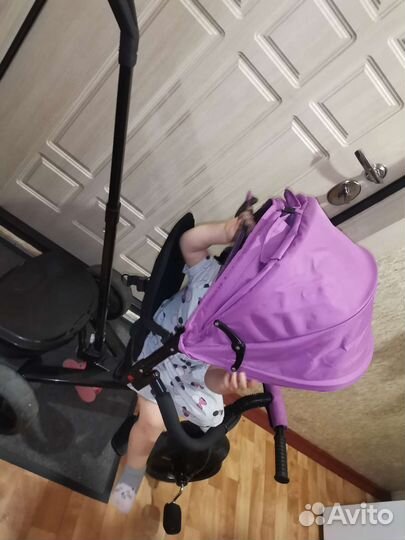 Трехколесный велосипед с ручкой