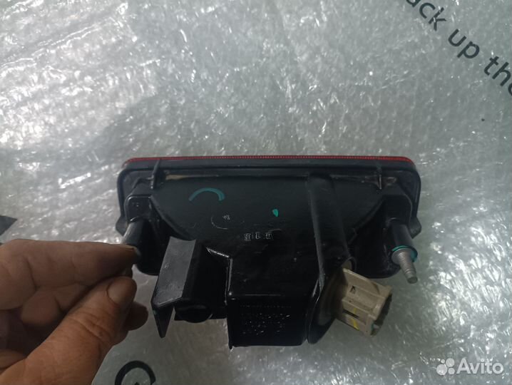 Фонарь противотуманный задний Nissan Tiida C11