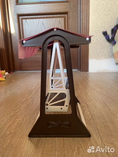 Игрушечная качель