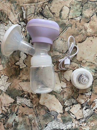 Электрический молокоотсос