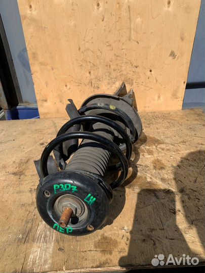 Стойка амортизатор передняя левая Peugeot 307