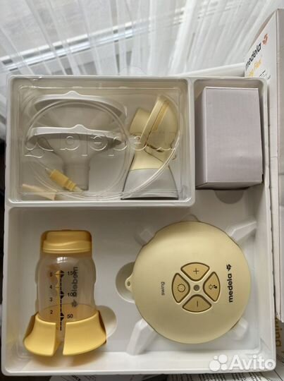 Молокоотсос medela swing flex электрический