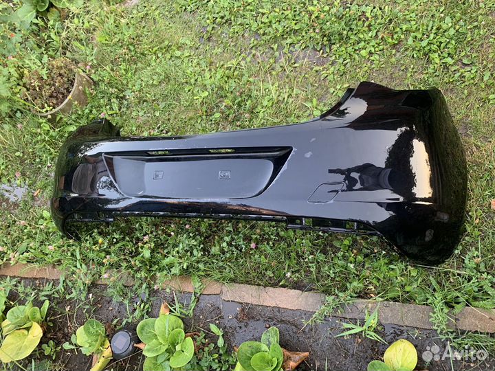 Бампер задний чёрный Opel Astra