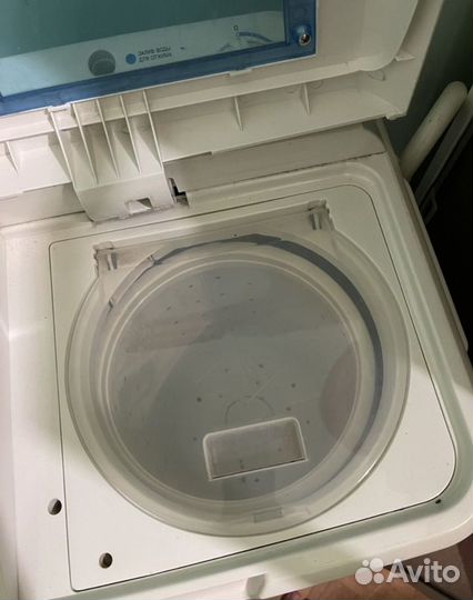 Стиральная машинка с вертикальной загрузкой