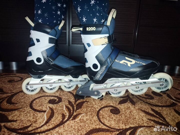 Роликовые коньки