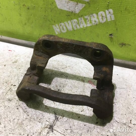 Скоба суппорта переднего Рено Сценик