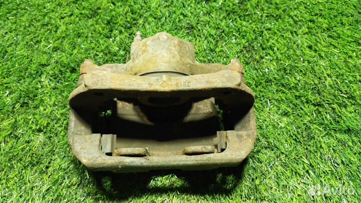 Суппорт тормозной передний левый Chevrolet Cruze