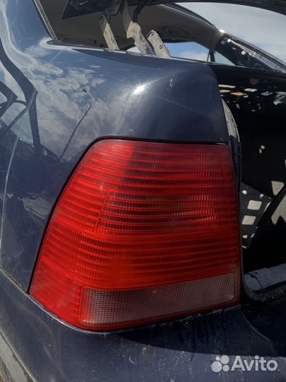 Фонарь задний левый VW Bora седан