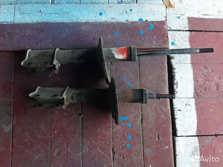 Передние стойки рено сандеро