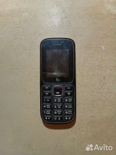 Телефон fly (без батареи) система работает