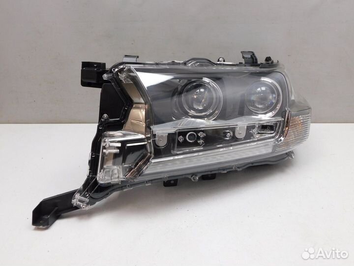 Фара левая Toyota Land Cruiser