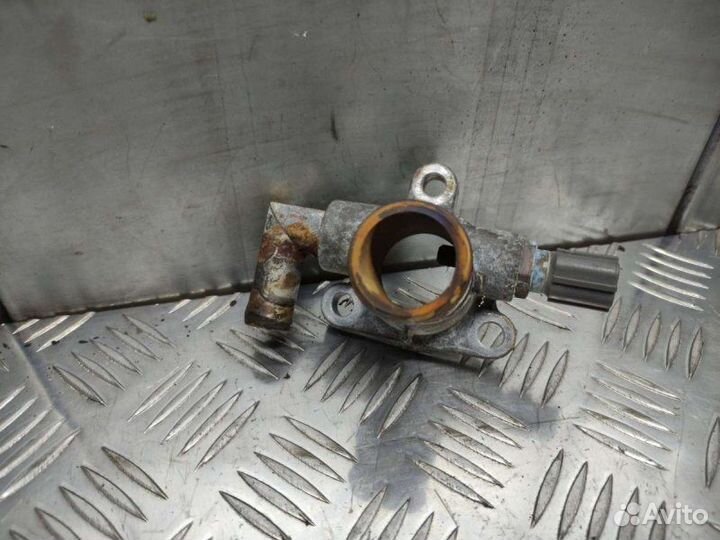 Фланец (тройник) системы охлаждения Suzuki Liana