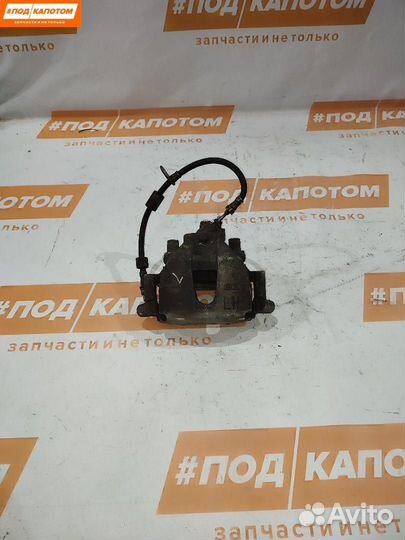 Суппорт тормозной передний левый Ford Focus