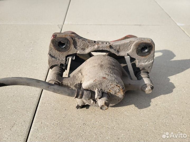 Тормозной суппорт передний правый Chevrolet Лачетт