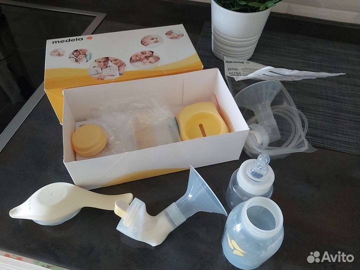 Молокоотсос medela