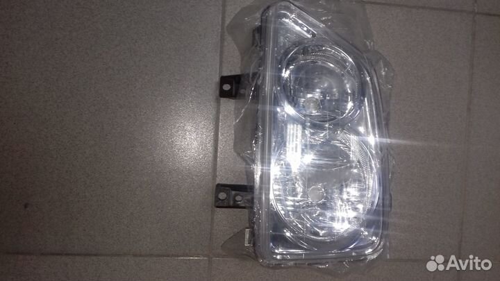Фара левая Daihatsu