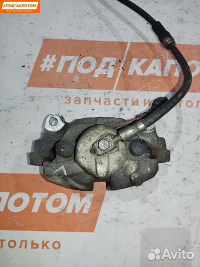 Суппорт тормозной передний левый Skoda Octavia