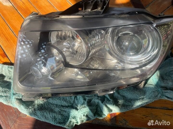 Фара левая jeep grand cherokee wk2
