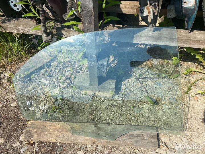 Стекло дверное заднее правое Kia Spectra седан