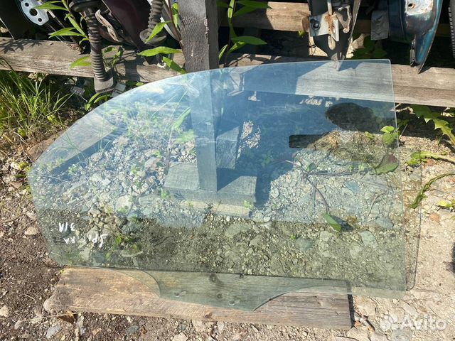 Стекло дверное заднее правое Kia Spectra седан