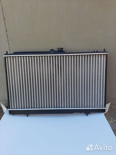 Радиатор охлаждения двигателя Мицубиси Лансер 9