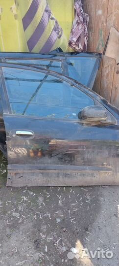 Двери на ниссан альмера н16 хэтчбек