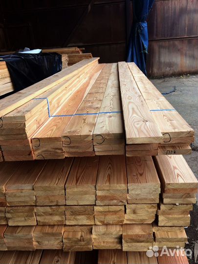 Доски лиственницы: прочный строительный материал