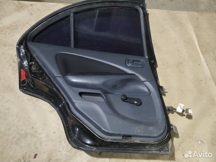 Дверь задняя левая Nissan Almera N16
