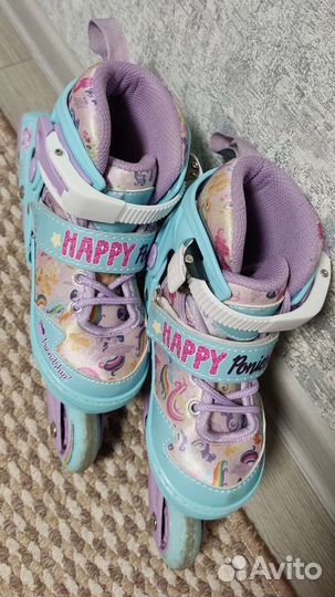 Роликовые коньки