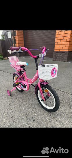 Детский четырёхколёсный велосипед