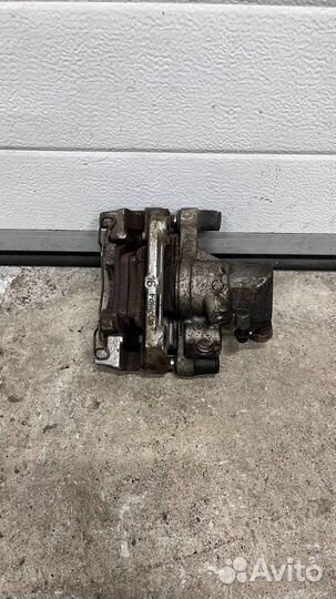 Суппорт задний левый мазда 3