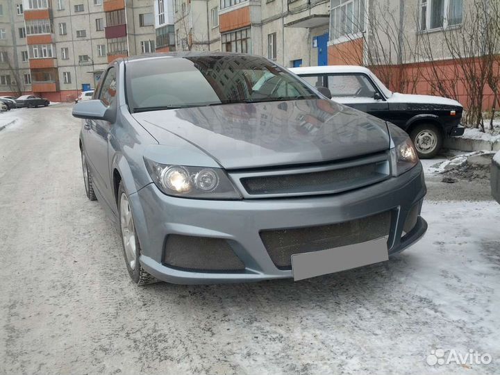 Реснички на фары Opel astra H