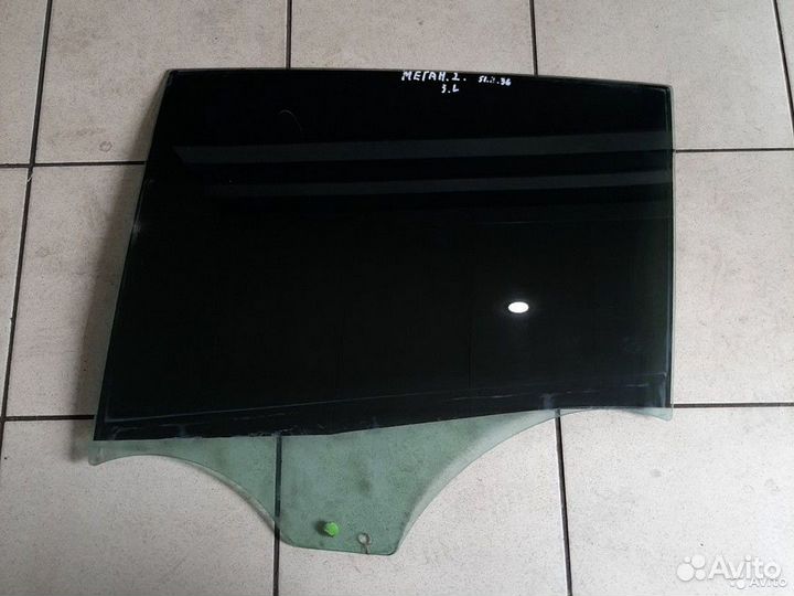 Стекло двери заднее левое Renault Megan 2