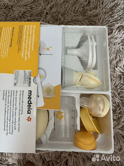 Молокоотсос medela swing flex