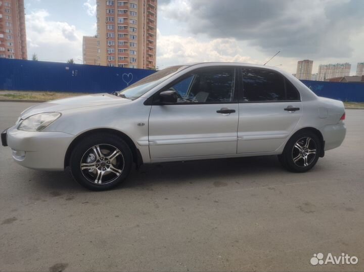 Mitsubishi Lancer 1.3 МТ, 2005, 193 000 км