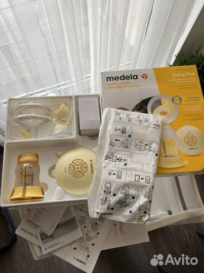 Молокоотсос medela swing flex электрический