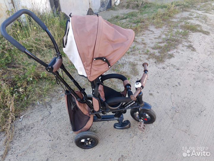 Трёхколёсный велосипед коляска