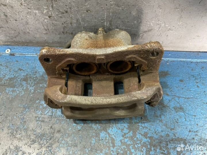 Суппорт передний левый Mazda Cx-7 ER