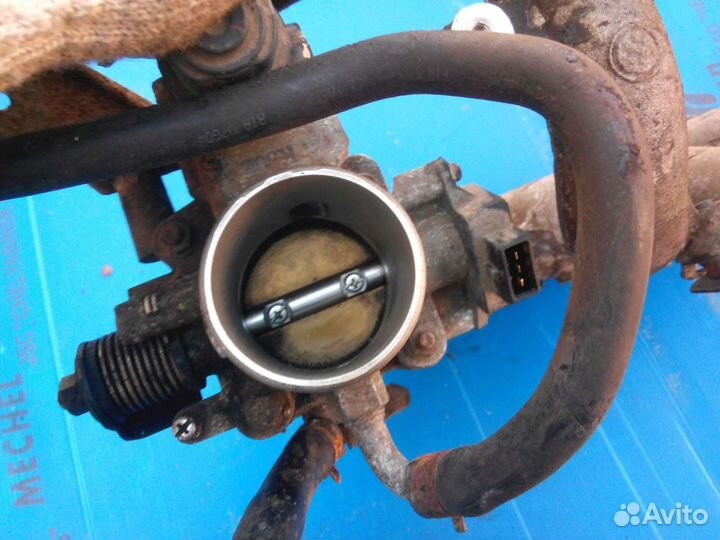 Дросельная заслонка Киа Спектра