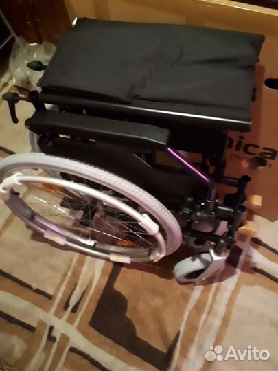 Инвалидная коляска