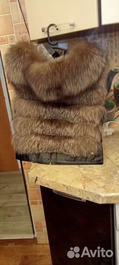 Жилетка меховая женская